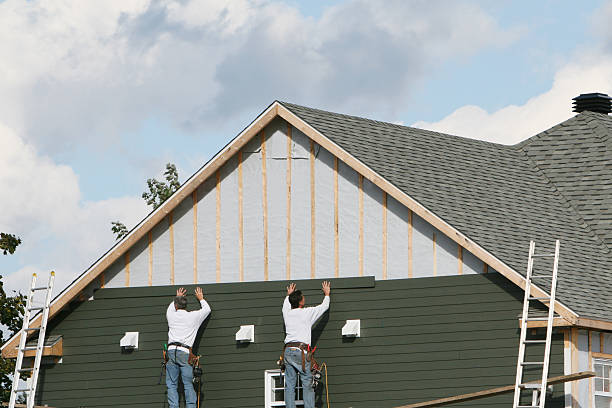 Professional Siding technician working in Fairview, GA